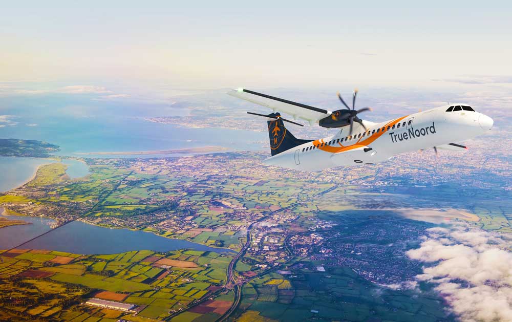 TrueNoord ATR72 aircraft flying over Dublin, Ireland